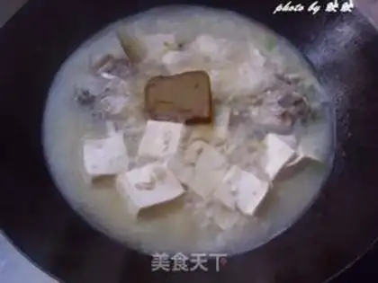 Make Curry fish head tofu soup step 5