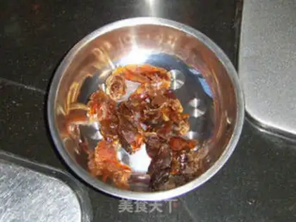 Make Longan lotus seed and honey glutinous porridge step 7