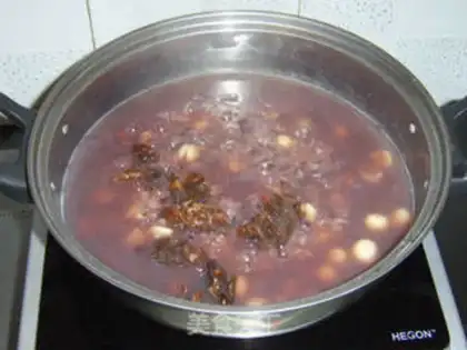 Make Longan lotus seed and honey glutinous porridge step 9