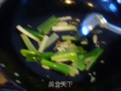 Make Braised salmon strips with green onions step 4