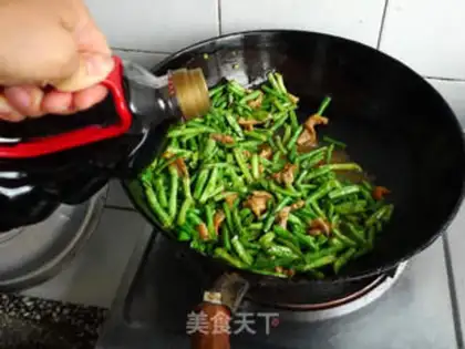 Make stir-fried tender beans in sauce step 6