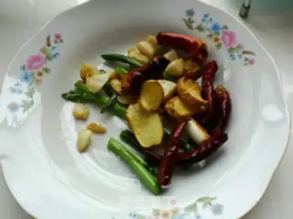 Make stir-fried chicken with tea tree mushroom step 5
