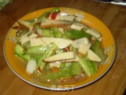 Make stir-fried dried bean curd with cold melon step 7