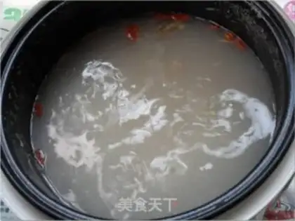 Make Congee with minced pork and cabbage step 2