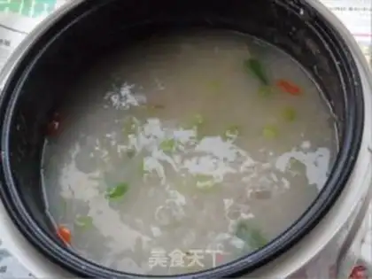 Make Congee with minced pork and cabbage step 3