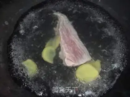 Make congee with pork and century step 1
