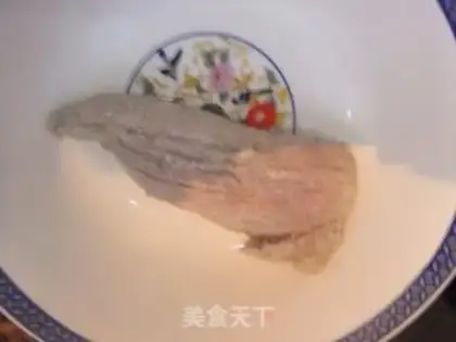 Make congee with pork and century step 2