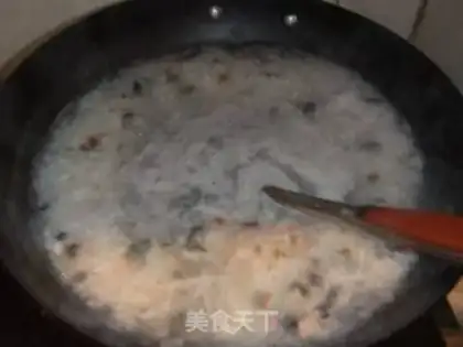 Make congee with pork and century step 6