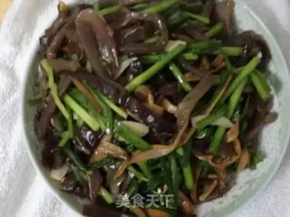 Make stir-fried yellow flowers with fungus step 5