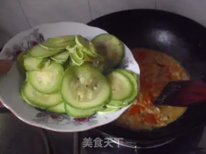 Make stir-fried pumpkin skin with zucchini step 7