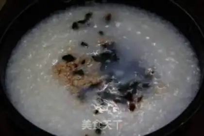 Make congee with pork and century step 3