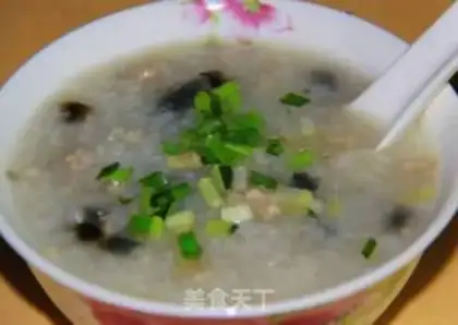 Make congee with pork and century step 5