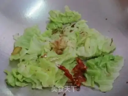 Make Dry stir-fried shredded cabbage step 4