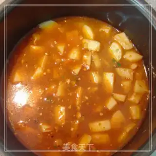 Make Potato braised rice step 7