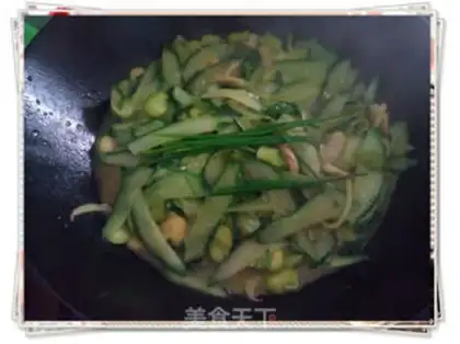 Make stir-fried broad beans with cucumber step 6