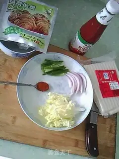 Make Fried rice cake with spicy cabbage step 0