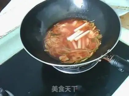 Make Fried rice cake with spicy cabbage step 4