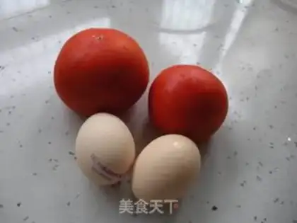 Make Scrambled eggs with diced tomatoes step 0