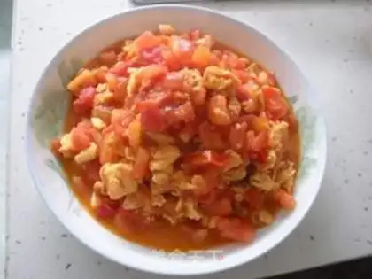 Make Scrambled eggs with diced tomatoes step 6