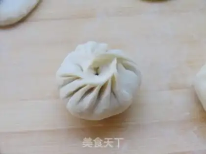 Make Steamed buns with onion and pork step 12