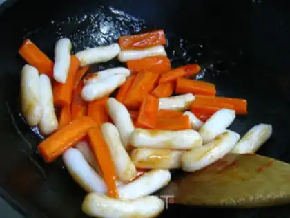 Make Rice cake with tomato sauce step 5
