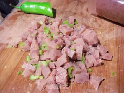 Make braised rice with donkey meat step 10