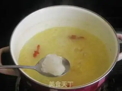 Make Gardenia flower, wolfberry and millet porridge step 6