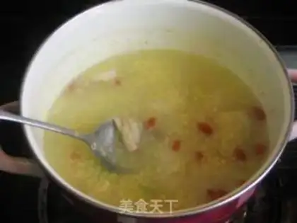 Make Gardenia flower, wolfberry and millet porridge step 8
