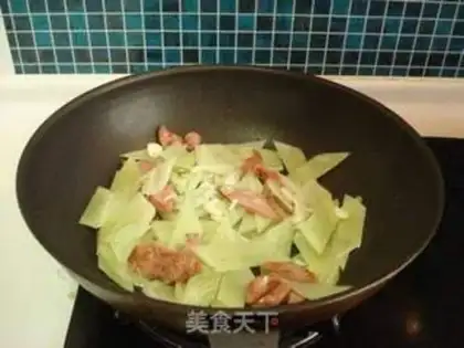 Make stir-fried ham with lettuce step 5