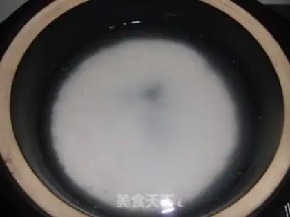 Make congee with pork and century step 3