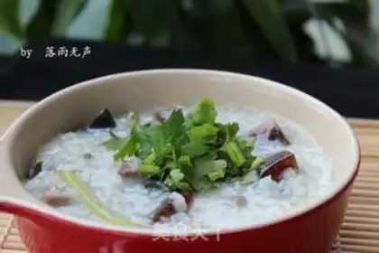 Make congee with pork and century step 8