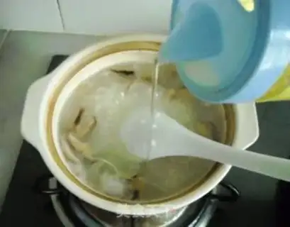 Make Egg shrimp congee step 11