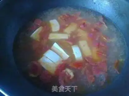 Make Tomato egg tofu soup step 5