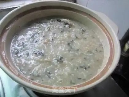 Make Porridge of salty pork step 7