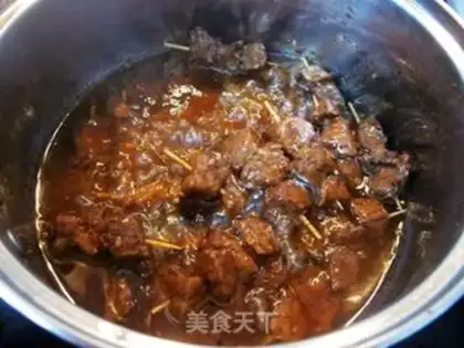Make Spicy toothpick beef step 4