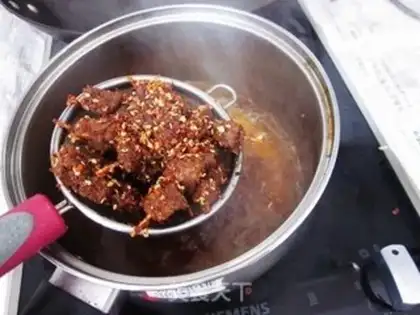 Make Spicy toothpick beef step 5