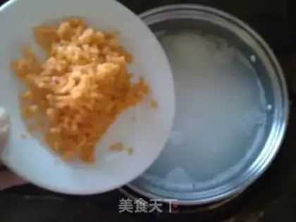 Make Tomato carrot egg congee step 2