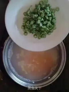 Make Tomato carrot egg congee step 3