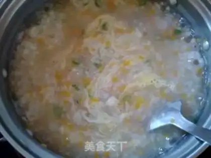 Make Tomato carrot egg congee step 5