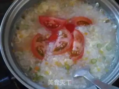 Make Tomato carrot egg congee step 6