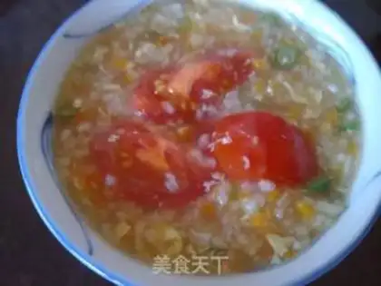 Make Tomato carrot egg congee step 8