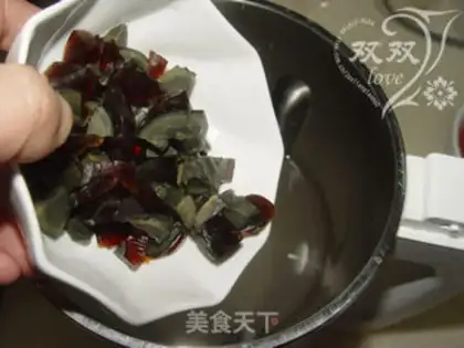 Make Beef leather egg congee step 6