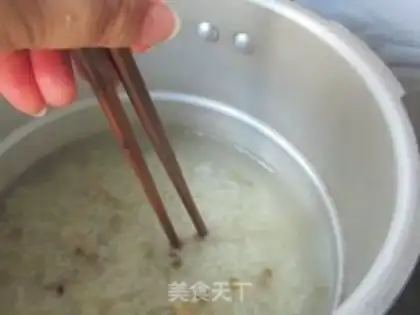Make Lotus green bean congee step 6