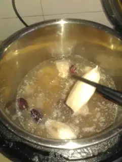 Make Ink fish stewed with flowers step 3