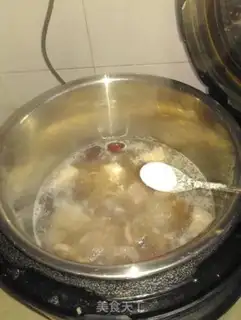 Make Ink fish stewed with flowers step 4