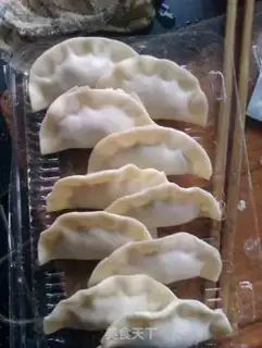 Make Celery mushroom pork dumplings step 7