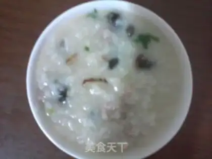 Make Skinny meat and mushroom congee step 6