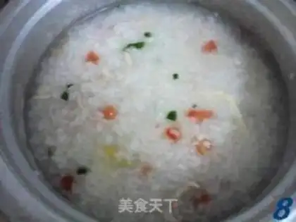 Make Chicken and tomato congee step 7