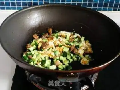 Make cucumber sausage fried rice step 5