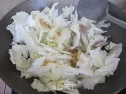 Make Pork cabbage. Frozen tofu step 6